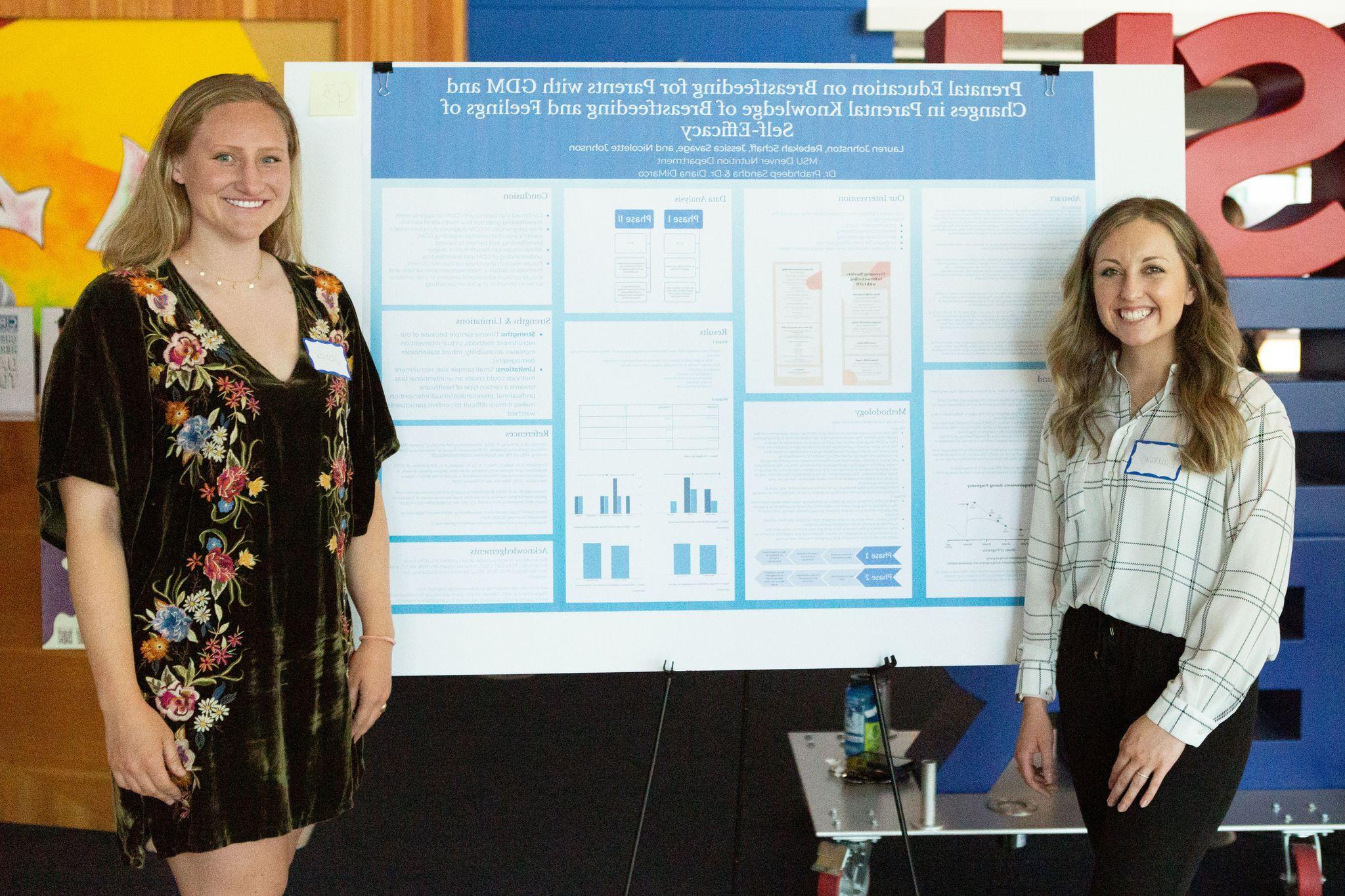Students presenting at a conference
