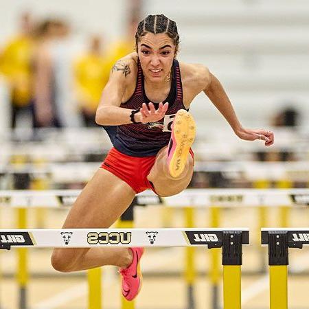 Maya Ries competes in the 2023 Colorado Running Company UCCS Invitational at the Mountain Lion Fieldhouse at the University of Colorado in Colorado Springs on Jan. 21, 2023. Photo by Darral Freund